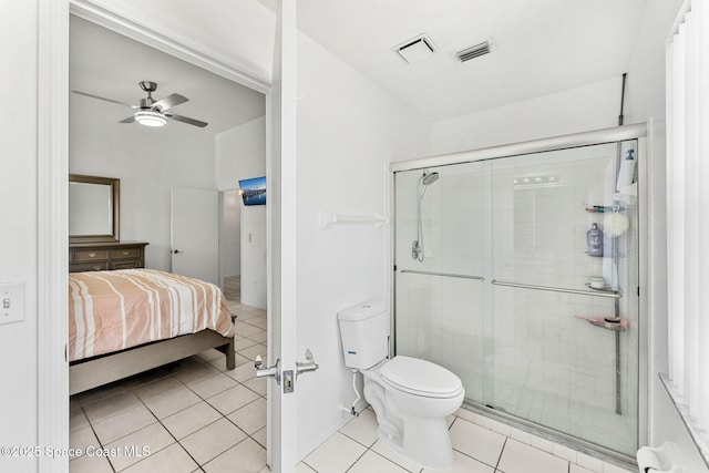 1157 Goldenrod Cir NE, Palm Bay, FL 32905 - full bath featuring toilet, a stall shower, visible vents, and tile patterned floors