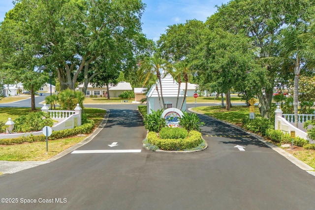 1157 Goldenrod Cir NE, Palm Bay, FL 32905 - view of road featuring traffic signs