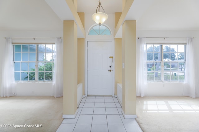1872 Crane Creek Blvd, Melbourne, FL 32940 - entrance foyer with baseboards and light colored carpet