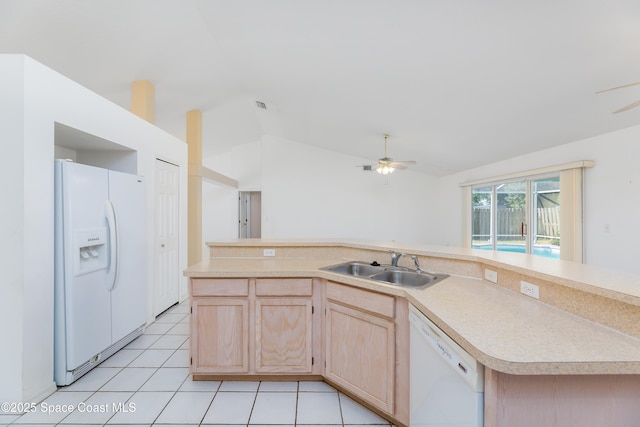1872 Crane Creek Blvd, Melbourne, FL 32940 - kitchen featuring a ceiling fan, vaulted ceiling, a sink, light brown cabinets, and white appliances