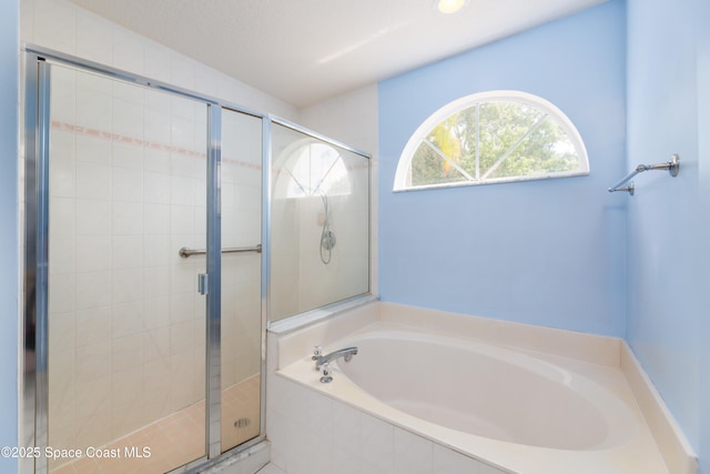 1872 Crane Creek Blvd, Melbourne, FL 32940 - bathroom featuring recessed lighting, a bath, and a stall shower