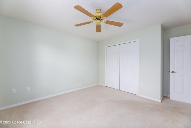 1872 Crane Creek Blvd, Melbourne, FL 32940 - unfurnished bedroom featuring baseboards, light colored carpet, and a closet