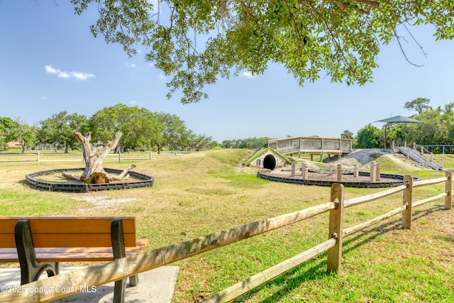 1872 Crane Creek Blvd, Melbourne, FL 32940 - view of community featuring a lawn and fence