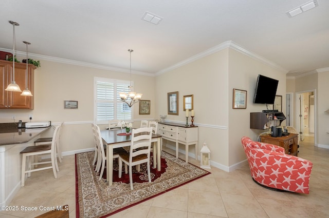 dining room with ornamental molding, visible vents, a notable chandelier, and light tile patterned floors