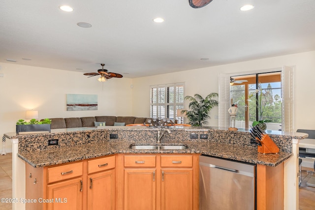 1472 Bent Palm Dr, Merritt Island, FL 32952 - kitchen with stainless steel dishwasher, a sink, ceiling fan, recessed lighting, and open floor plan