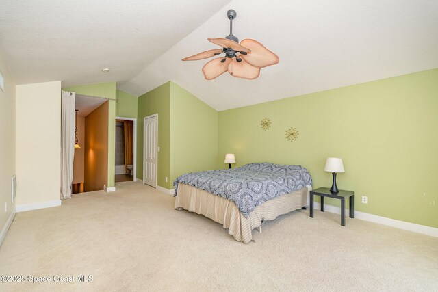 1472 Bent Palm Dr, Merritt Island, FL 32952 - bedroom with vaulted ceiling, light colored carpet, a closet, baseboards, and a ceiling fan