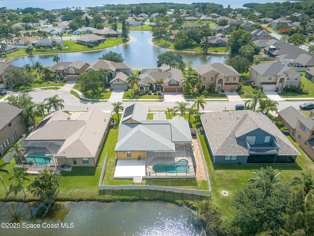 1472 Bent Palm Dr, Merritt Island, FL 32952 - aerial perspective of suburban area featuring a large body of water and a pool area