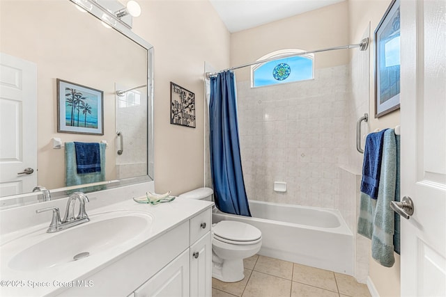 bathroom featuring tile patterned floors, shower / bath combo, toilet, and plenty of natural light