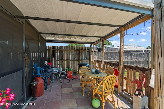 view of patio / terrace with fence