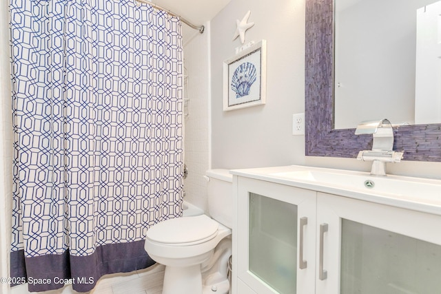 full bath with toilet, vanity, and shower / tub combo with curtain