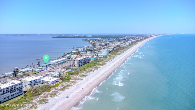 aerial view with a beach view and a water view