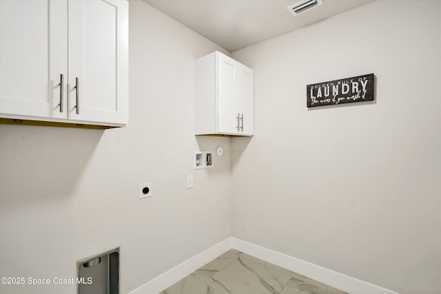laundry area with hookup for an electric dryer, baseboards, visible vents, hookup for a washing machine, and cabinet space