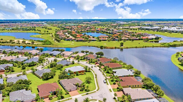 3196 Quint Dr, Melbourne, FL 32940 - aerial view of residential area with a nearby body of water and a local golf course