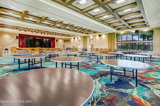 3196 Quint Dr, Melbourne, FL 32940 - community lobby featuring coffered ceiling, beamed ceiling, and recessed lighting