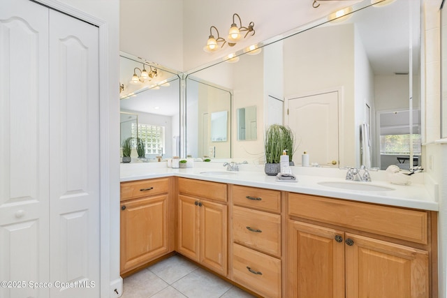 3196 Quint Dr, Melbourne, FL 32940 - full bath with double vanity, tile patterned floors, and a closet