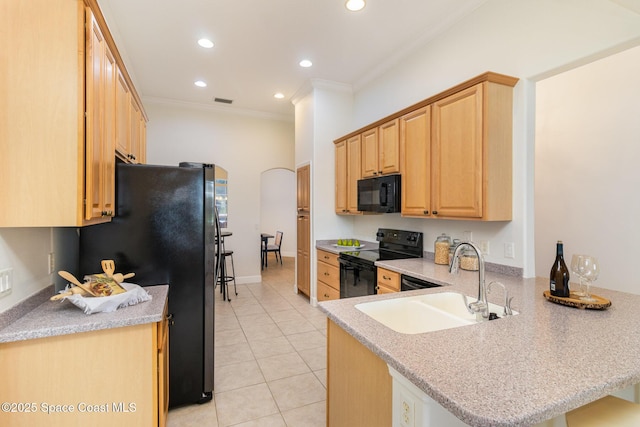 3196 Quint Dr, Melbourne, FL 32940 - kitchen featuring black appliances, a sink, ornamental molding, a peninsula, and light brown cabinets