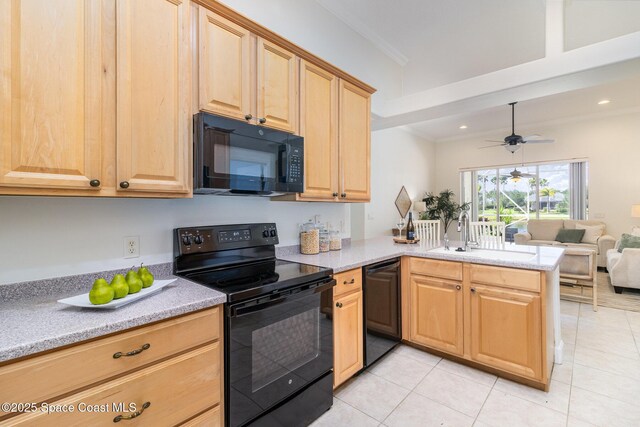 3196 Quint Dr, Melbourne, FL 32940 - kitchen with black appliances, a sink, light tile patterned flooring, a peninsula, and recessed lighting