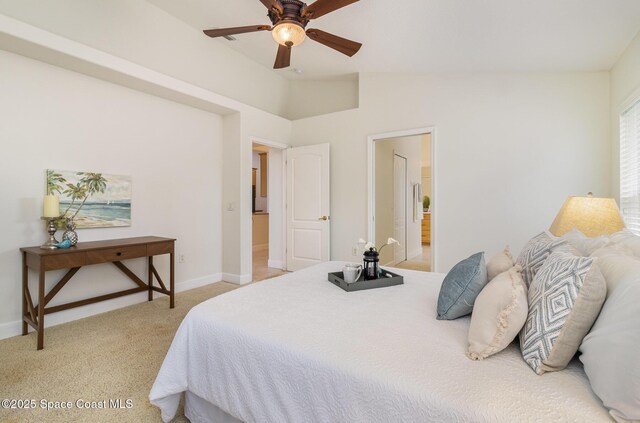 3196 Quint Dr, Melbourne, FL 32940 - bedroom with light colored carpet, lofted ceiling, baseboards, and ceiling fan