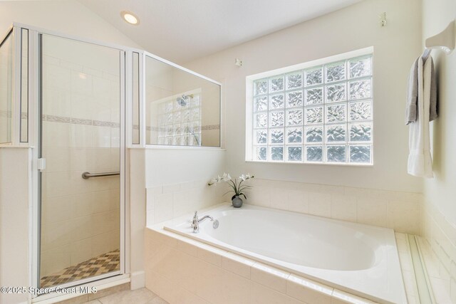 3196 Quint Dr, Melbourne, FL 32940 - full bathroom featuring healthy amount of natural light, a bath, a shower stall, recessed lighting, and tile patterned floors