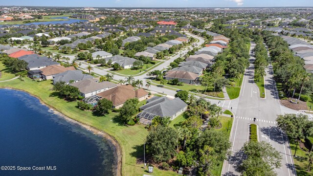 3196 Quint Dr, Melbourne, FL 32940 - aerial view of property and surrounding area featuring a nearby body of water and nearby suburban area