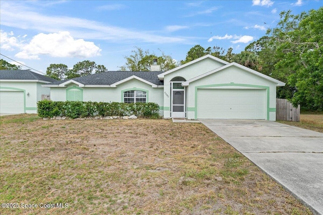 6280 Golfview Ave, Cocoa, FL 32927 - ranch-style home featuring concrete driveway, an attached garage, a front yard, and stucco siding