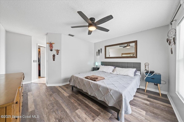 6280 Golfview Ave, Cocoa, FL 32927 - bedroom featuring visible vents, a textured ceiling, and wood finished floors