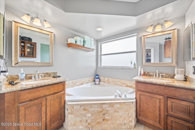 6280 Golfview Ave, Cocoa, FL 32927 - bathroom with a sink, a bath, and two vanities