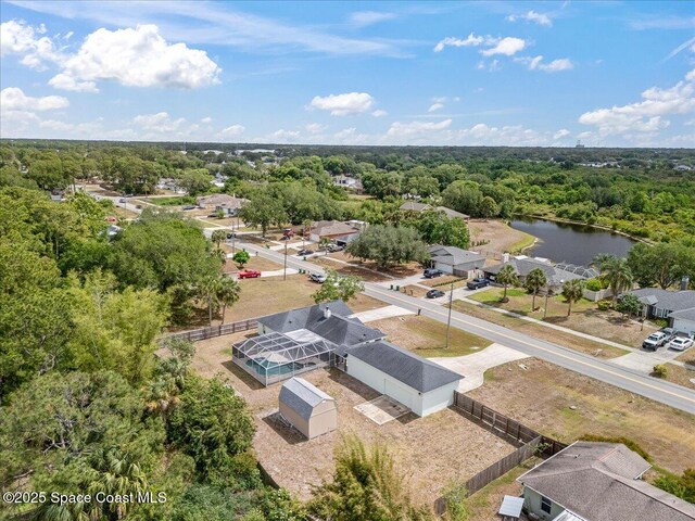 6280 Golfview Ave, Cocoa, FL 32927 - drone / aerial view featuring a water view and a view of trees