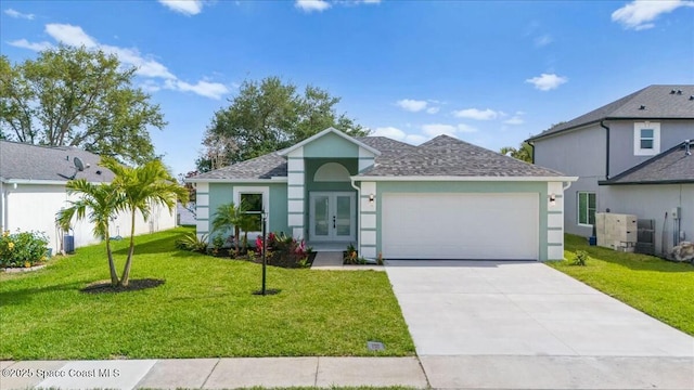 3871 La Flor Dr, Rockledge, FL 32955 - single story home featuring french doors, an attached garage, a front lawn, and stucco siding