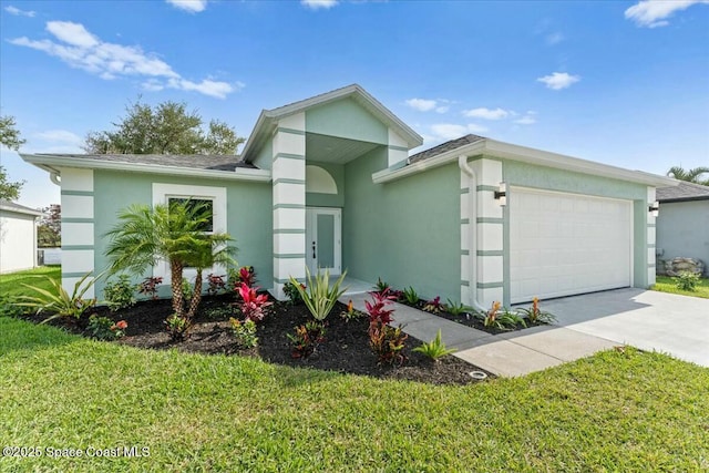 3871 La Flor Dr, Rockledge, FL 32955 - view of front of house featuring a front lawn, concrete driveway, stucco siding, roof with shingles, and a garage