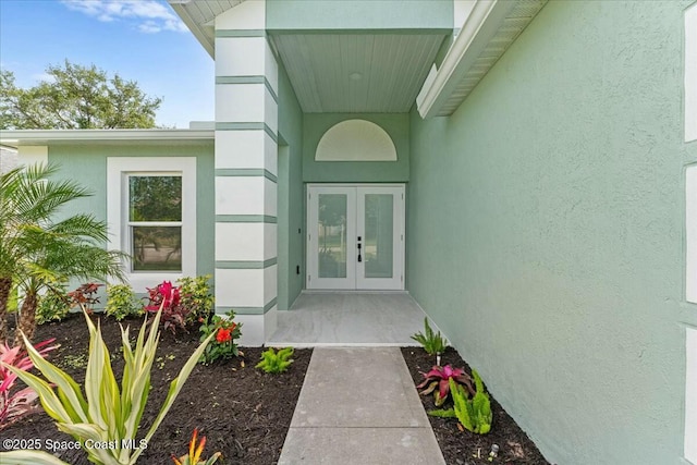 3871 La Flor Dr, Rockledge, FL 32955 - doorway to property featuring french doors and stucco siding