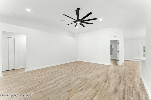 3871 La Flor Dr, Rockledge, FL 32955 - unfurnished living room with recessed lighting, lofted ceiling, baseboards, light wood-style flooring, and ceiling fan