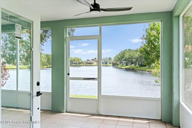 3871 La Flor Dr, Rockledge, FL 32955 - unfurnished sunroom featuring plenty of natural light, a ceiling fan, and a water view