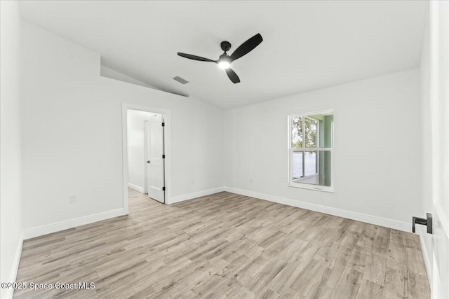 3871 La Flor Dr, Rockledge, FL 32955 - spare room with wood finished floors, visible vents, lofted ceiling, and ceiling fan