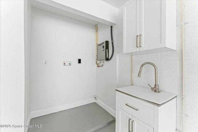3871 La Flor Dr, Rockledge, FL 32955 - laundry area featuring washer hookup and baseboards