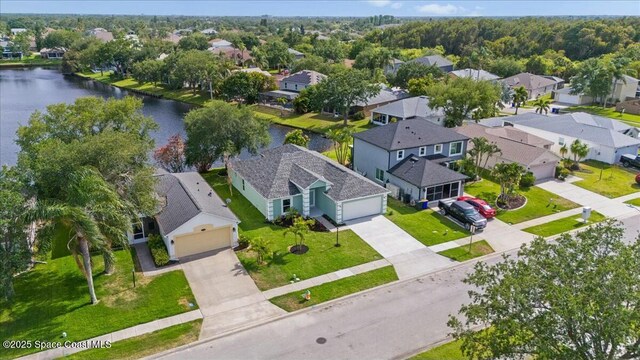 3871 La Flor Dr, Rockledge, FL 32955 - birds eye view of property featuring a water view and a residential view