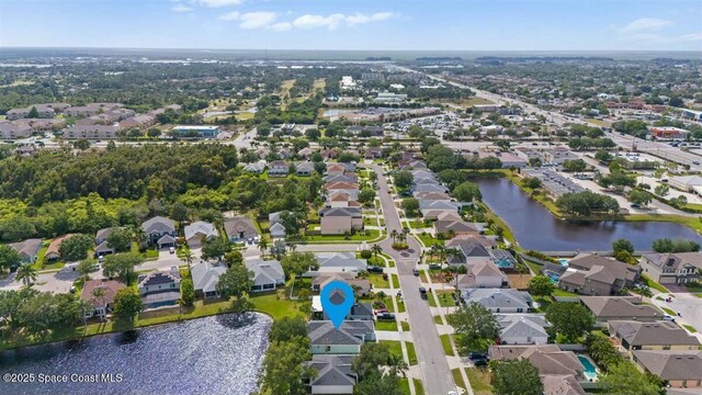 3871 La Flor Dr, Rockledge, FL 32955 - birds eye view of property featuring a residential view and a water view