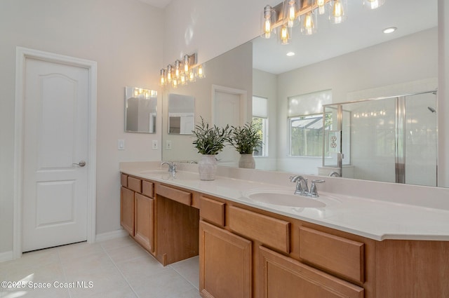 5334 Creekwood Dr, Melbourne, FL 32940 - full bathroom with tile patterned flooring, double vanity, a sink, and a stall shower