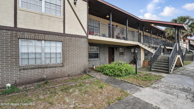 3050 Sir Hamilton Cir Unit 2, Titusville, FL 32780 - view of property featuring stairs