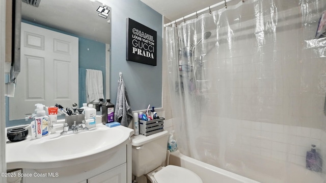 3050 Sir Hamilton Cir Unit 2, Titusville, FL 32780 - full bathroom featuring vanity, toilet, and shower / bath combination with curtain