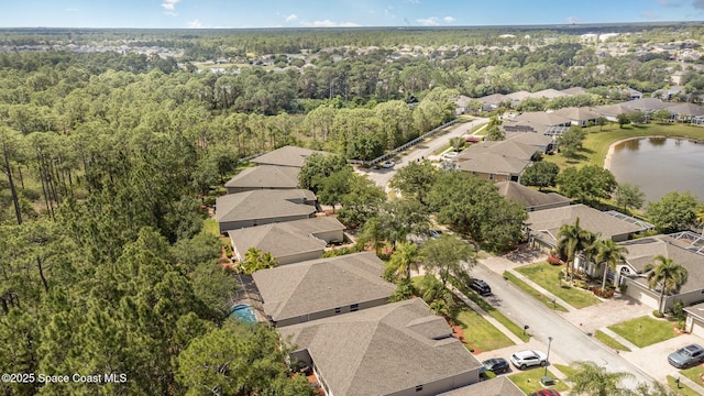 439 Gardendale Cir SE, Palm Bay, FL 32909 - bird's eye view with a forest view, a residential view, and a water view