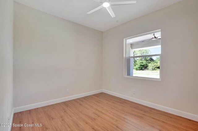 2742 Fling Ave SE, Palm Bay, FL 32909 - spare room with baseboards, a ceiling fan, and light wood finished floors