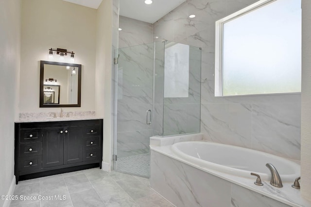 2742 Fling Ave SE, Palm Bay, FL 32909 - bathroom featuring a bath, baseboards, vanity, and a marble finish shower