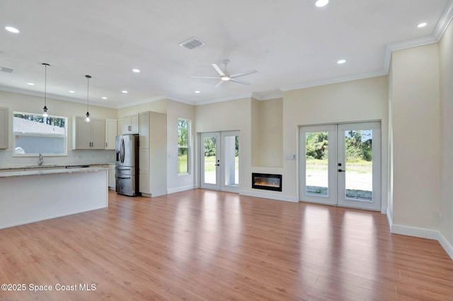 2742 Fling Ave SE, Palm Bay, FL 32909 - unfurnished living room with recessed lighting, a ceiling fan, visible vents, and light wood-type flooring