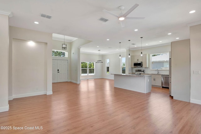 2742 Fling Ave SE, Palm Bay, FL 32909 - unfurnished living room featuring recessed lighting, light wood-type flooring, visible vents, and a ceiling fan