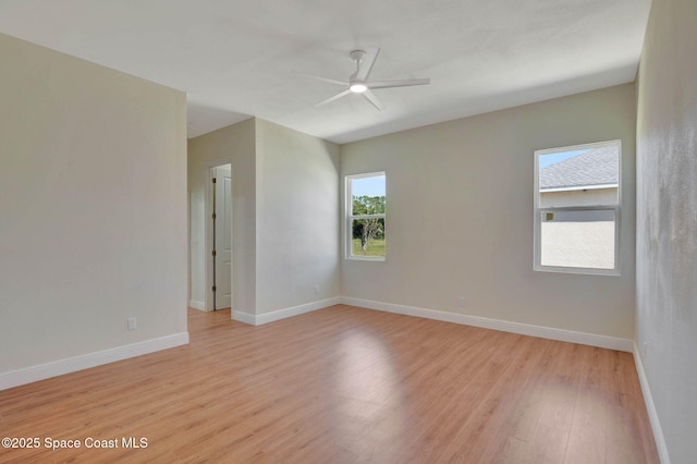 2742 Fling Ave SE, Palm Bay, FL 32909 - unfurnished room with light wood-style flooring, baseboards, and ceiling fan