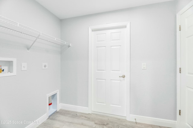 washroom featuring hookup for an electric dryer, light wood finished floors, baseboards, laundry area, and washer hookup