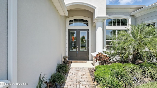 3630 Kite St, Titusville, FL 32796 - view of exterior entry with stucco siding