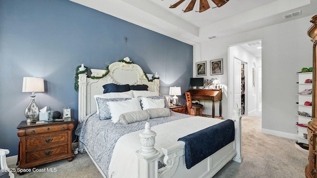 3630 Kite St, Titusville, FL 32796 - carpeted bedroom with baseboards, a ceiling fan, and visible vents