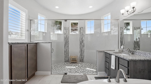 3630 Kite St, Titusville, FL 32796 - full bath with recessed lighting, baseboards, vanity, and a stall shower